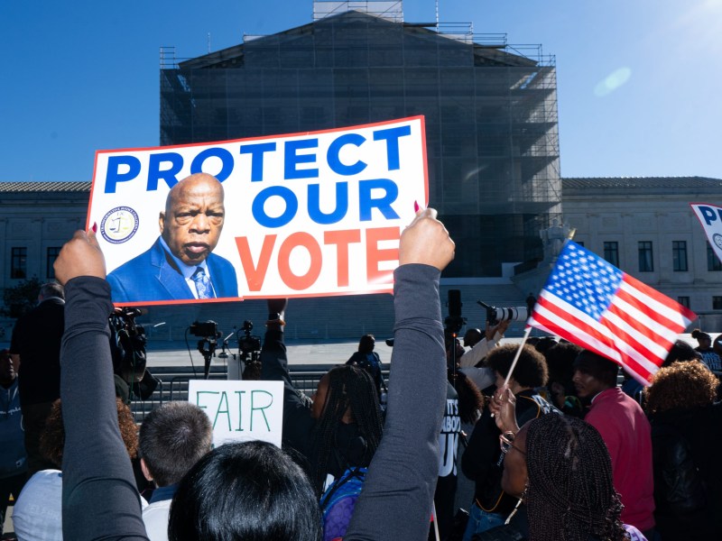 Protesters gather outside the Supreme Court on October 15, 2025, as the Court considers Louisiana v. Callais, a case that could hollow out the Voting Rights Act and open the door to more aggressive gerrymandering.